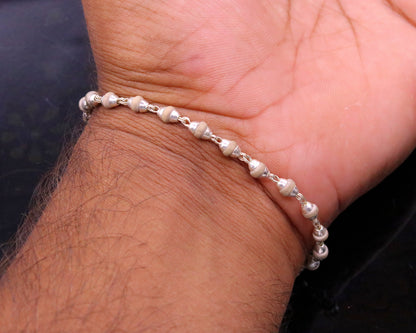 Sterling silver handmade unisex basil rosary beads bracelet with flexible design, crafted by Tribal Ornaments.