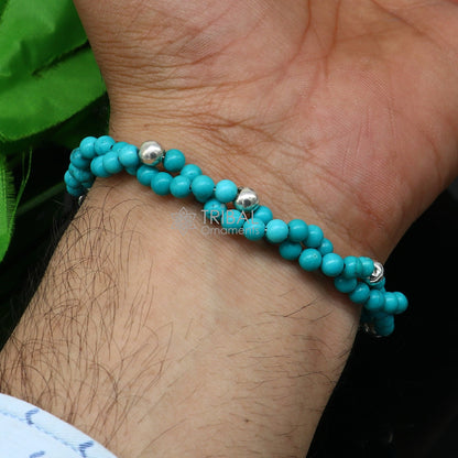 Tribal Ornaments blue turquoise stone adjustable sterling silver unisex beaded bracelet with stylish custom design.