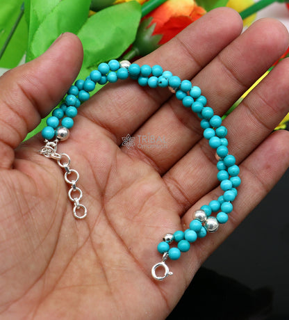 Trendy blue turquoise stone sterling silver adjustable unisex bracelet with beaded design, handmade jewelry by Tribal Ornaments.