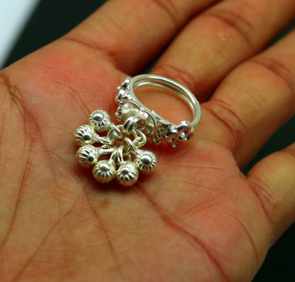 Sterling silver handmade jingling bells ring with cultural design, ideal as belly dance jewelry, featuring customizable details.