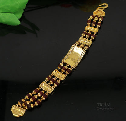 22k yellow gold handmade Rudraksha beads bracelet with tiger design, men's luxury wedding jewelry by TRIBAL ORNAMENTS.