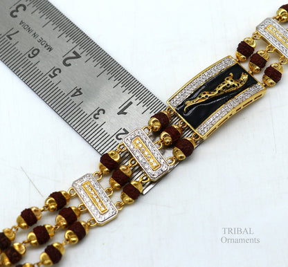 22k yellow gold handmade Rudraksha beads bracelet with tiger design, crafted by TRIBAL ORNAMENTS, luxurious men's wedding jewelry.