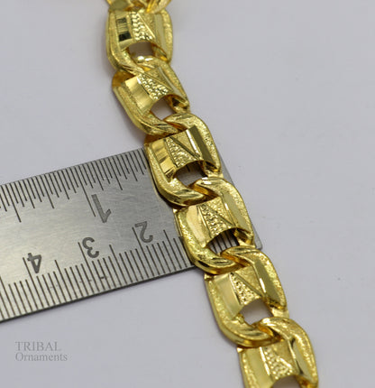 22KT yellow gold handcrafted designer flexible bracelet with diamond-cut details, stylish unisex jewelry by TRIBAL ORNAMENTS.