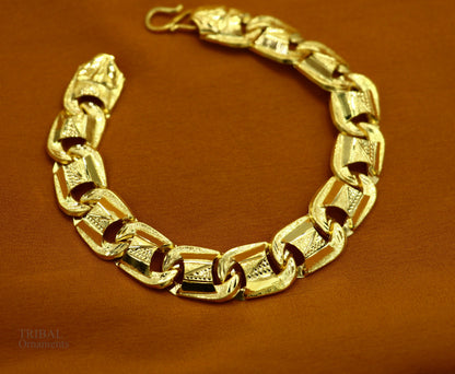 22KT yellow gold handcrafted diamond-cut designer flexible bracelet by Tribal Ornaments, stylish unisex jewelry with intricate design.
