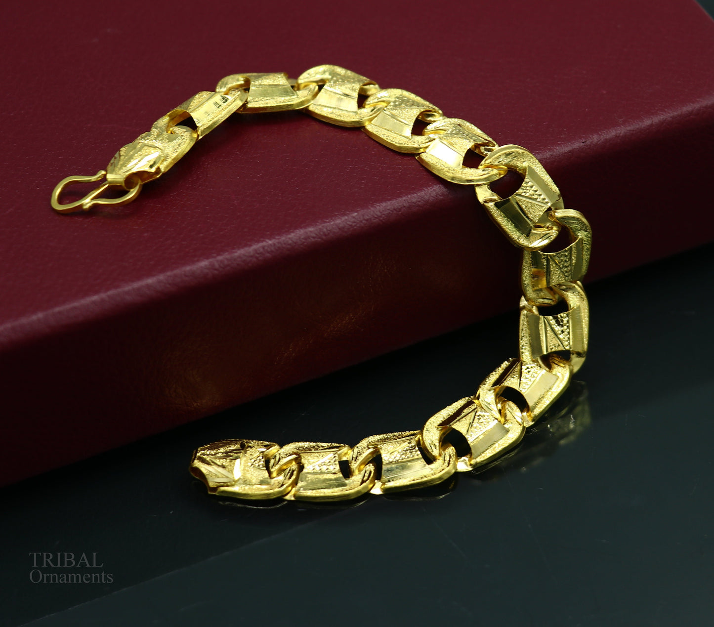 22KT yellow gold handcrafted designer flexible bracelet with diamond-cut details, stylish unisex jewelry by Tribal Ornaments.
