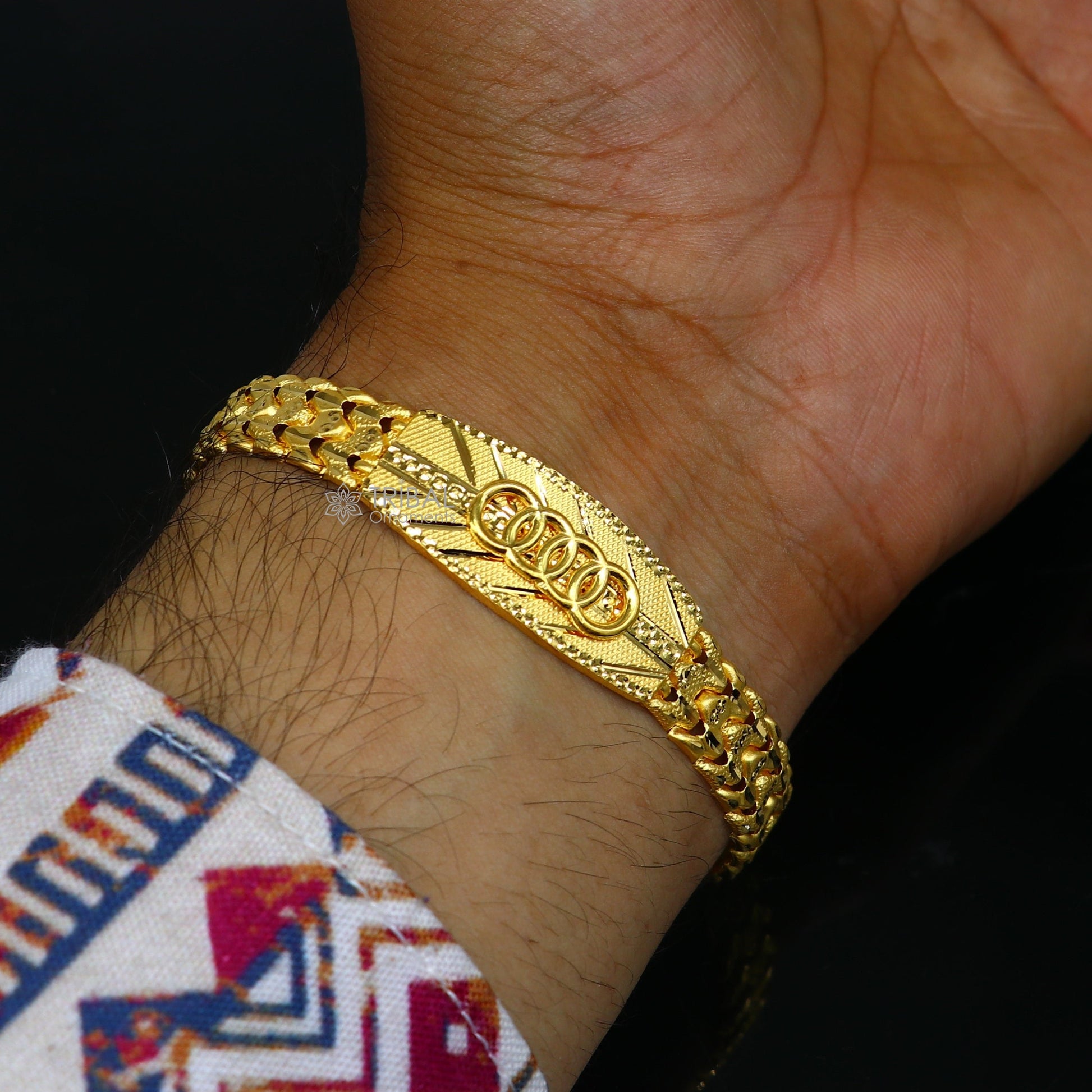 22KT yellow gold handmade Audi chain bracelet by Tribal Ornaments, unisex stylish fancy bracelet with 916 hallmarked detailing.