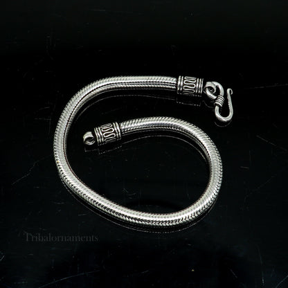 Sterling silver 4.5mm snake chain bracelet by Tribal Ornaments, vintage-style unisex jewelry with intricate craftsmanship.