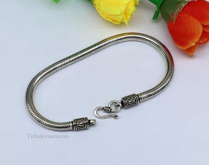Sterling silver snake chain bracelet by Tribal Ornaments, 4.5mm vintage-style unisex jewelry with intricate handmade design.