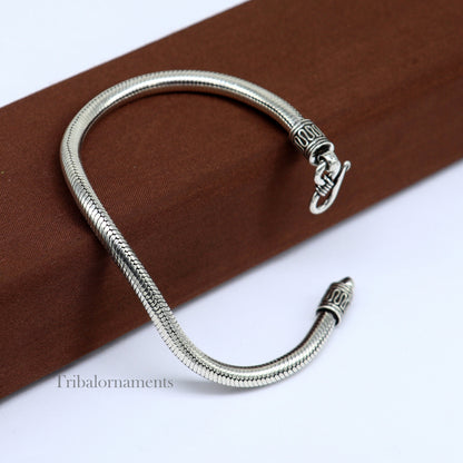 Sterling silver 4.5 mm snake chain bracelet by TRIBAL ORNAMENTS, unisex vintage style handmade jewelry, tribal-inspired design.