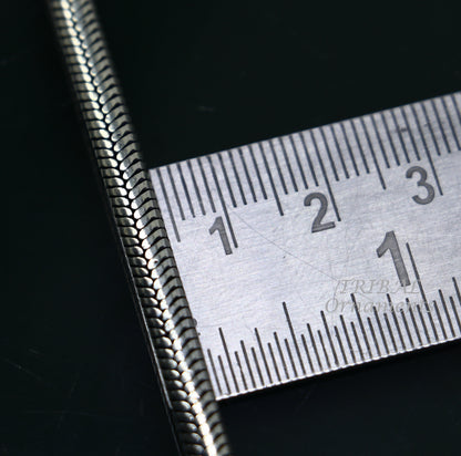 Sterling silver handmade snake chain bracelet from Rajasthan, India, featuring a flexible unisex design by Tribal Ornaments.