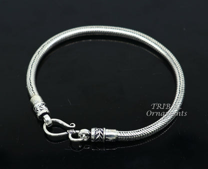 Sterling silver handmade snake chain bracelet from Rajasthan, featuring 4mm flexible unisex jewelry by Tribal Ornaments.