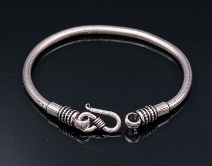 925 sterling silver snake chain bracelet by TRIBAL ORNAMENTS, flexible unisex jewelry with a sleek, handmade design from Rajasthan.