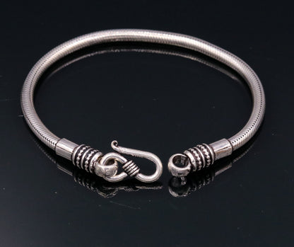 925 sterling silver snake chain bracelet by TRIBAL ORNAMENTS, flexible unisex jewelry with intricate handmade design from Rajasthan, India