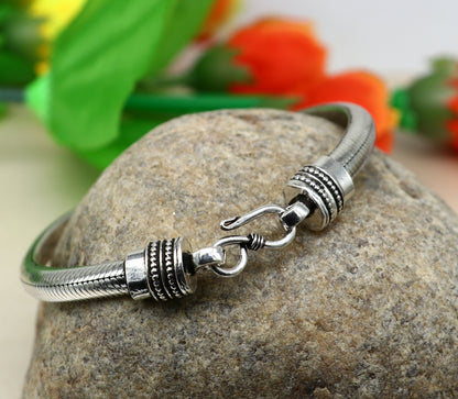 Sterling silver handmade snake chain bracelet with D-shape design, unisex half-round style by TRIBAL ORNAMENTS.