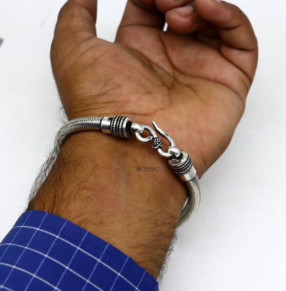 Sterling silver handmade snake chain bracelet, flexible unisex jewelry with elegant design and custom fit, crafted by Tribal Ornaments.