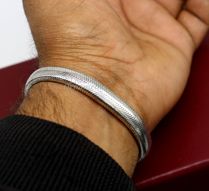Sterling silver half-round D shape snake chain bracelet by Tribal Ornaments, flexible unisex jewelry with heavy, solid design.