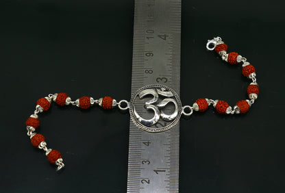 925 Sterling silver customized OM Rudraksha bead bracelet with Aum design, handcrafted by TRIBAL ORNAMENTS.