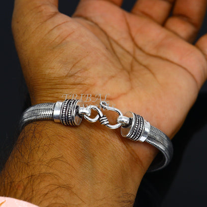 9mm sterling silver snake chain bracelet by Tribal Ornaments, flexible D-shape unisex jewelry with elegant half-round design.