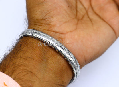 Sterling silver snake chain bracelet with D-shape design, flexible and unisex, handmade by Tribal Ornaments.