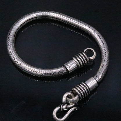 Vintage-style 5mm handmade sterling silver snake chain bracelet by Tribal Ornaments, unisex Indian tribal jewelry, 7-inch length.