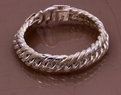 Vintage 7-inch 925 sterling silver Cuban link chain bracelet by Tribal Ornaments, unisex and handcrafted from India.