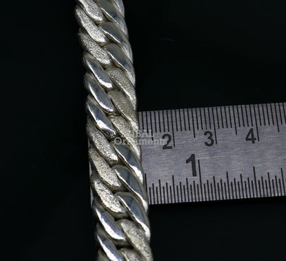 Unisex 7-inch sterling silver Cuban link chain bracelet by TRIBAL ORNAMENTS, vintage-style, solid, custom-made jewelry from India.
