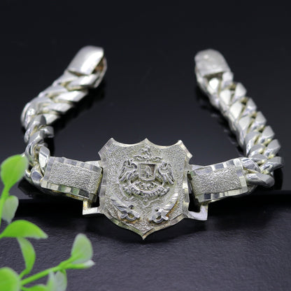 Vintage 7-inch solid 925 sterling silver Rajput Ranbanka Rathore logo bracelet by TRIBAL ORNAMENTS, handcrafted jewelry with intricate design.