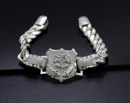 Vintage solid 925 sterling silver Rajput Ranbanka Rathore logo bracelet by Tribal Ornaments, handmade with intricate design.