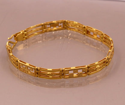 Authentic 22KT yellow gold handmade flexible unisex bracelet with solid design, hallmarked 916, Rajasthan India jewelry by Tribal Ornaments.
