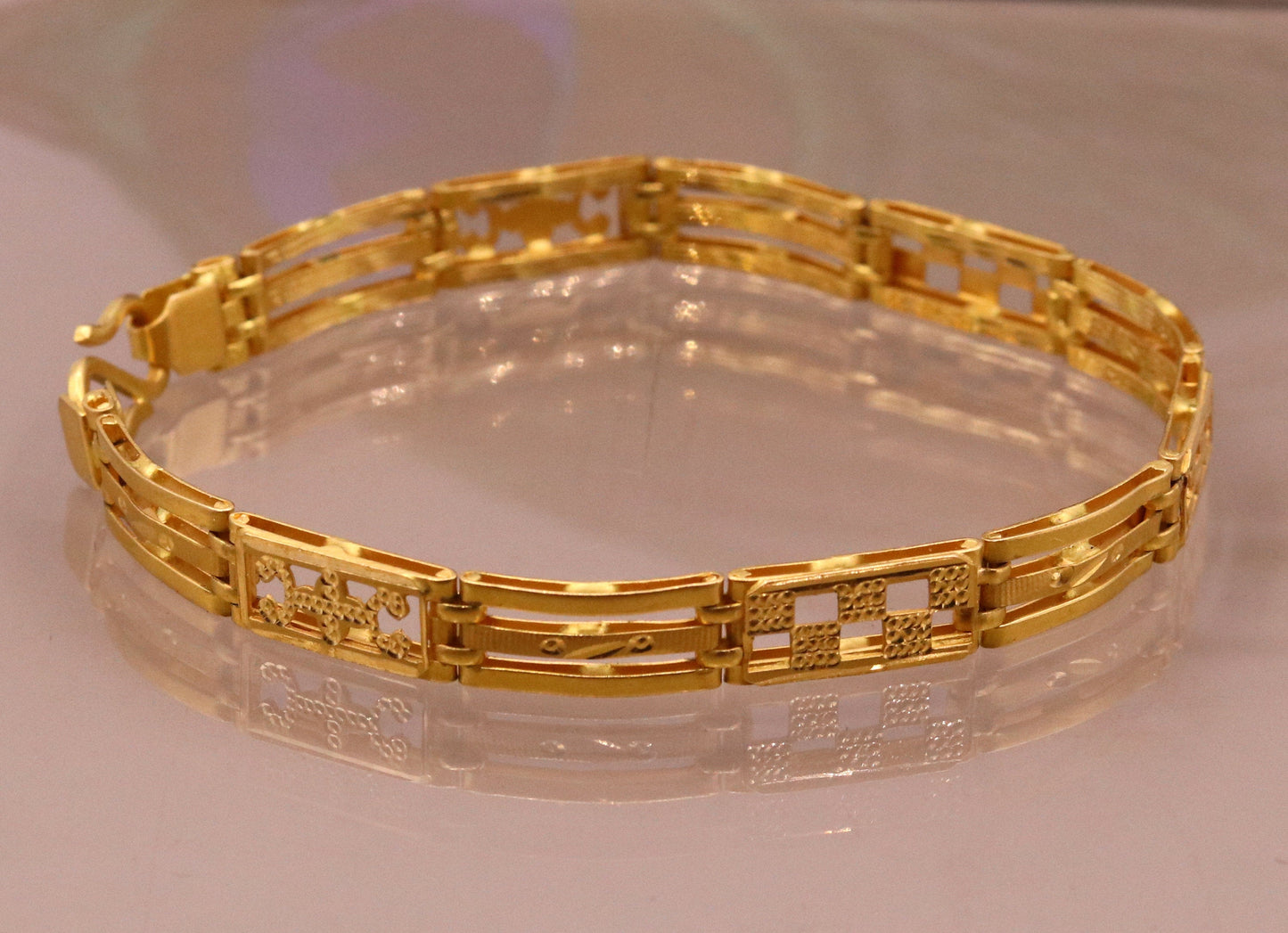 Authentic 22KT yellow gold handmade unisex flexible bracelet with solid design, hallmarked 916 Rajasthan India jewelry by TRIBAL ORNAMENTS.
