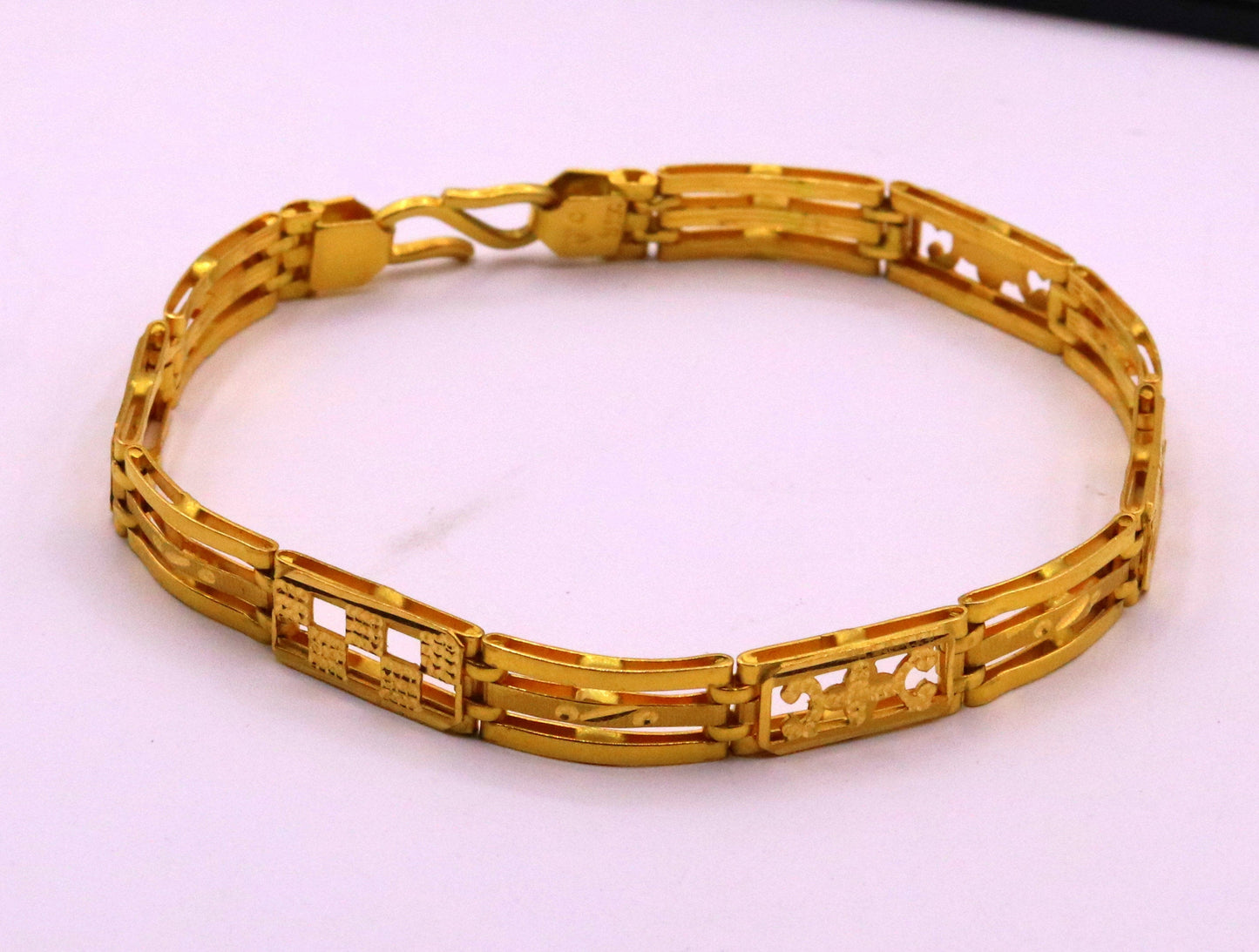 Authentic 22KT yellow gold handmade flexible unisex bracelet with hallmarked solid design from Rajasthan India jewelry.