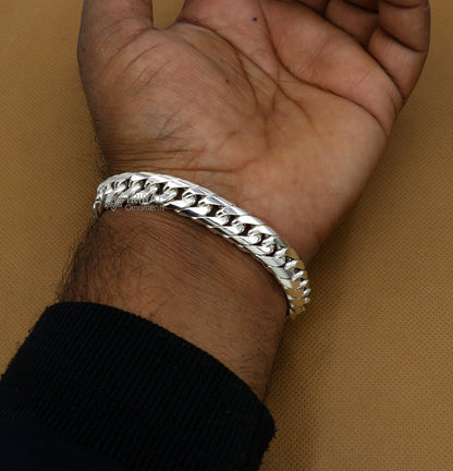 Sterling silver handmade men's bracelet with unique custom design, oxidized finish, heavy style, and royal jewelry details.