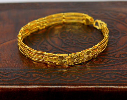 22kt yellow gold diamond cut flexible bracelet by Tribal Ornaments, stylish unisex jewelry with handmade design and 916 hallmark.