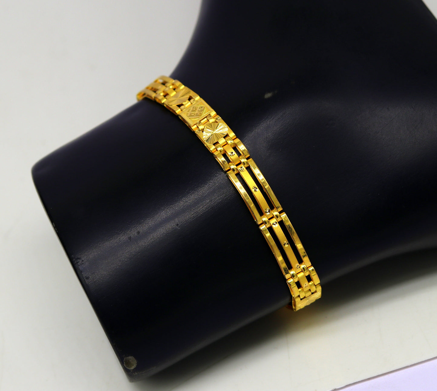 22kt yellow gold diamond cut flexible bracelet by TRIBAL ORNAMENTS, unisex handmade gold jewelry with stylish design and hallmark.
