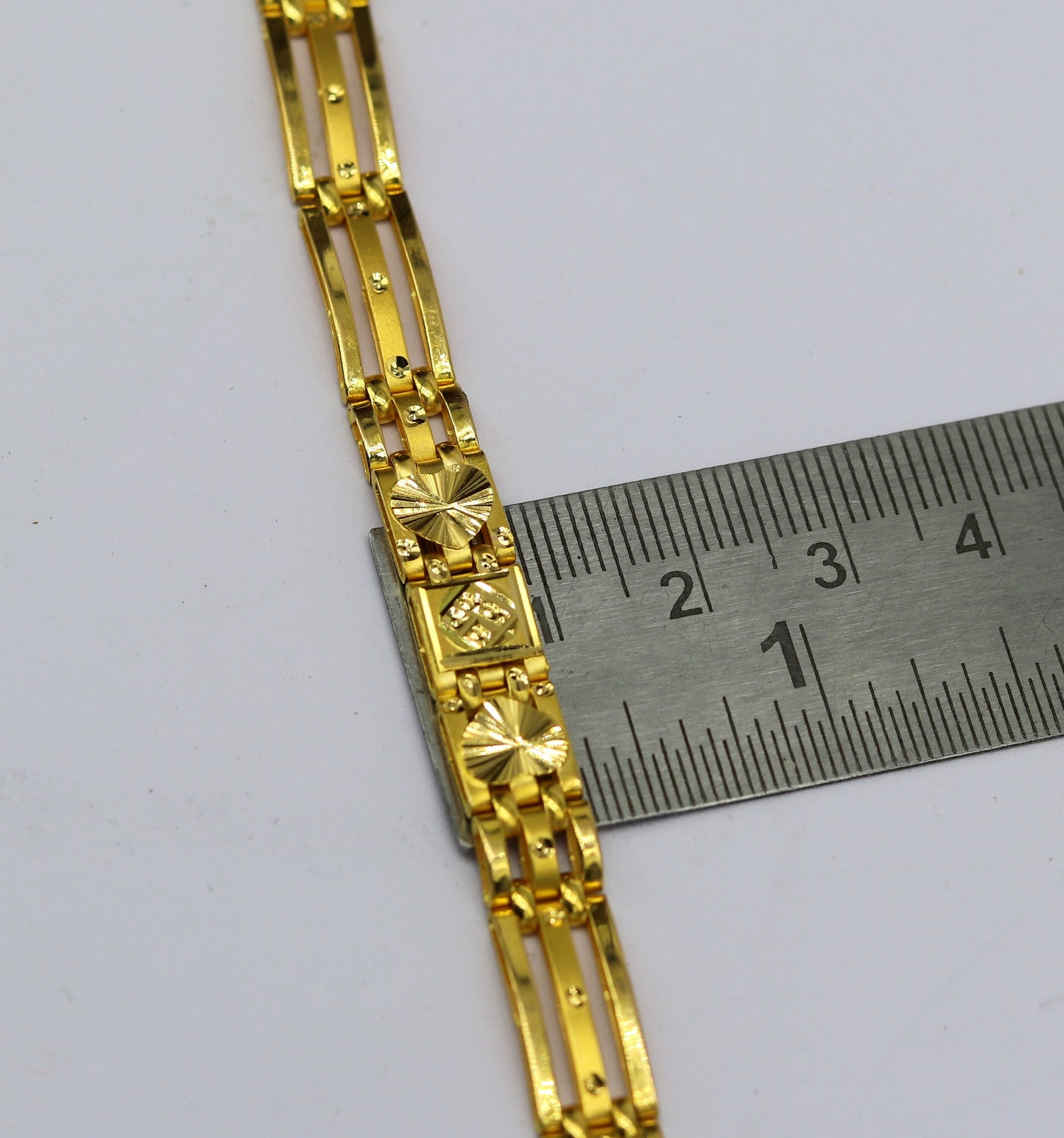 22kt yellow gold diamond cut flexible unisex bracelet by Tribal Ornaments, handmade stylish gold jewelry with hallmarked design.