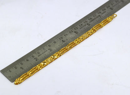 22kt yellow gold diamond cut flexible bracelet by TRIBAL ORNAMENTS, stylish unisex handmade gold jewelry with 916 hallmark.