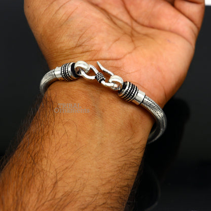 Sterling silver 6mm handmade snake chain bracelet, flexible unisex jewelry with elegant design and custom fit from Tribal Ornaments.