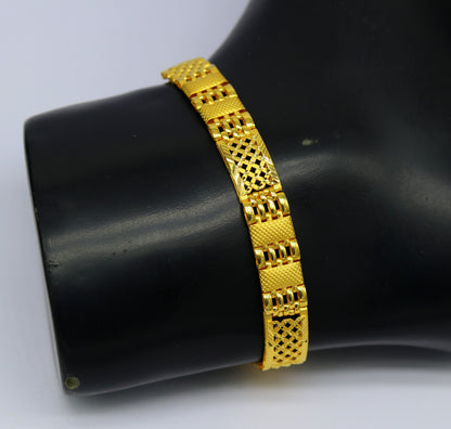 22kt yellow gold custom-made diamond cut flexible bracelet by TRIBAL ORNAMENTS featuring personalized fancy jewelry design.