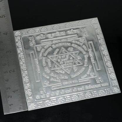Pure silver Shri Kuber Yantram idol for home temple puja, silver god yantram for spiritual offerings and worship.