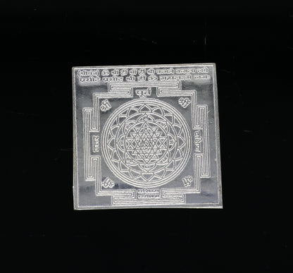 Small 3 cm solid silver Shri Laxmi Yantram with flat design, ideal for home temple puja, by Tribal Ornaments.