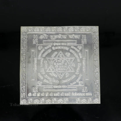 Solid silver Shri Kuber Yantram idol for home temple puja, intricate silver god yantra for spiritual rituals.