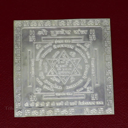 Solid silver Shri Kuber Yantram idol for home temple puja, intricate silver god yantra from Tribal Ornaments.