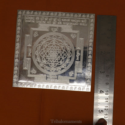 Pure silver Shri Laxmi Yantram for home temple puja, featuring detailed MahaLaxmi design from Tribal Ornaments.