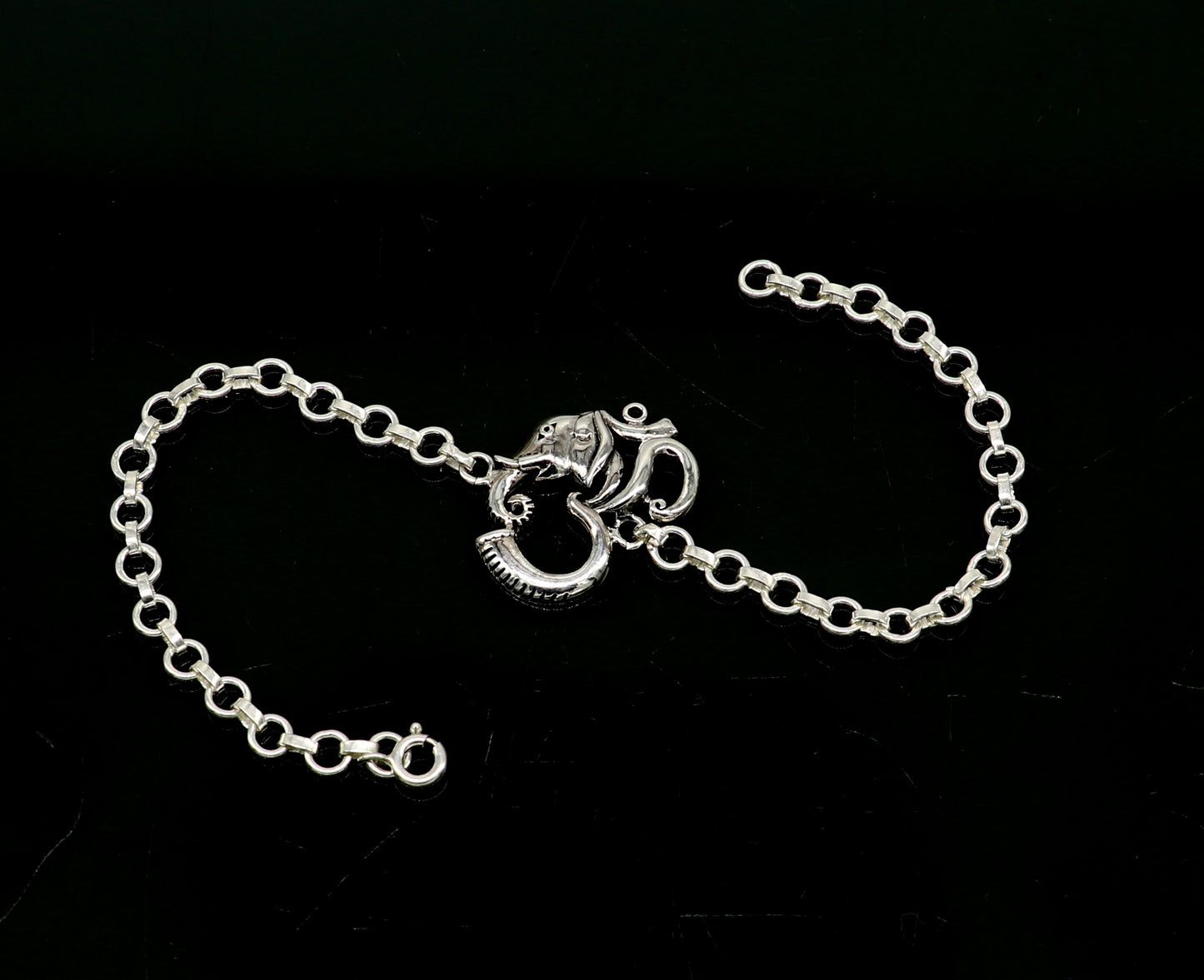 925 sterling silver Ganesha design bracelet by TRIBAL ORNAMENTS, handmade with OM symbols, 7-inch size and intricate details.