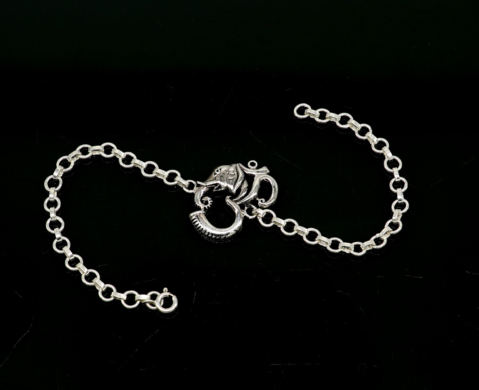 925 sterling silver Ganesha design bracelet by TRIBAL ORNAMENTS, handmade with OM symbols, 7-inch size and intricate details.