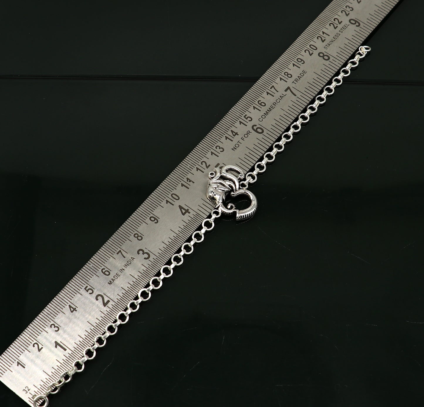 925 sterling silver Ganesha design bracelet by TRIBAL ORNAMENTS, handcrafted with OM and Aum symbols, 7-inch size.