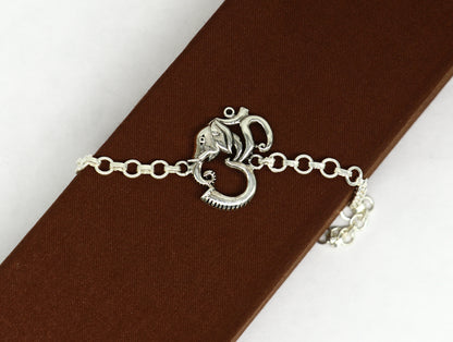 925 sterling silver Ganesha design bracelet by TRIBAL ORNAMENTS, 7-inch handmade bracelet with OM and AUM motifs.