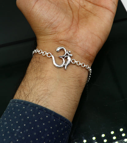 Sterling silver OM mantra bracelet by TRIBAL ORNAMENTS, handmade 7-inch bracelet with intricate OM design in all sizes.