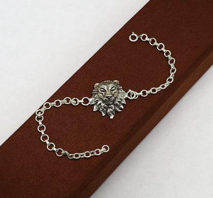 Sterling silver Narsimha lion face bracelet by TRIBAL ORNAMENTS, 7-inch handmade bracelet with intricate tribal design.