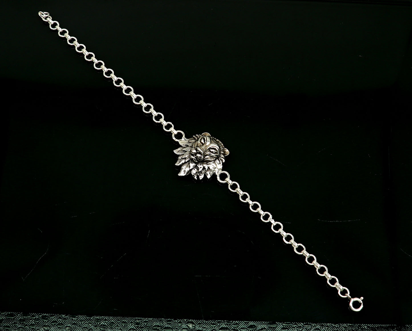 Sterling silver Narsimha lion face bracelet by TRIBAL ORNAMENTS, handcrafted design, available in all sizes, 7-inch length.